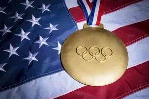 Do athletes get real gold medals?