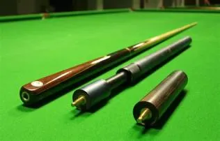 Is a snooker cue bigger than a pool cue?
