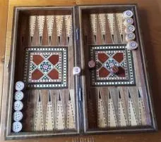 Is tavli the same as backgammon?
