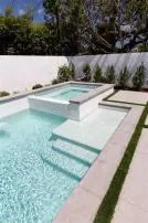 Why are swimming pools white?