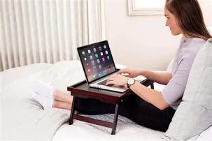 Is it ok to use laptop on bed?