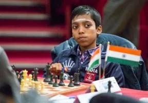 Who is the youngest to reach 2700 in chess?